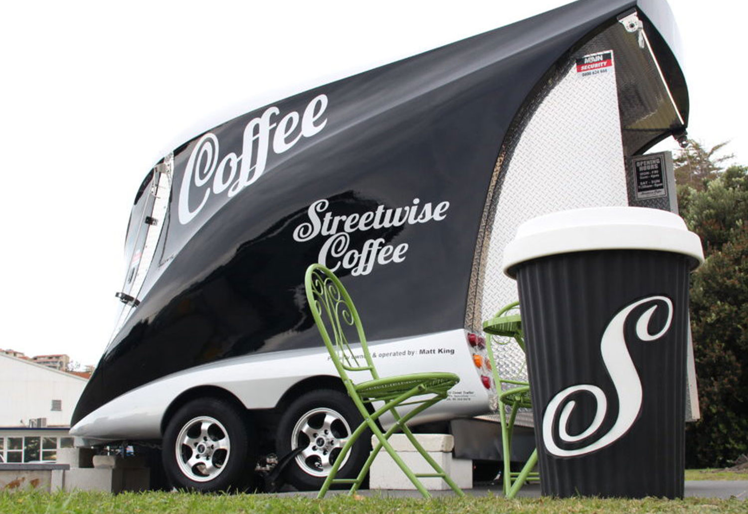 Image of a Streetwise Coffee Cart with takeaway cup in front