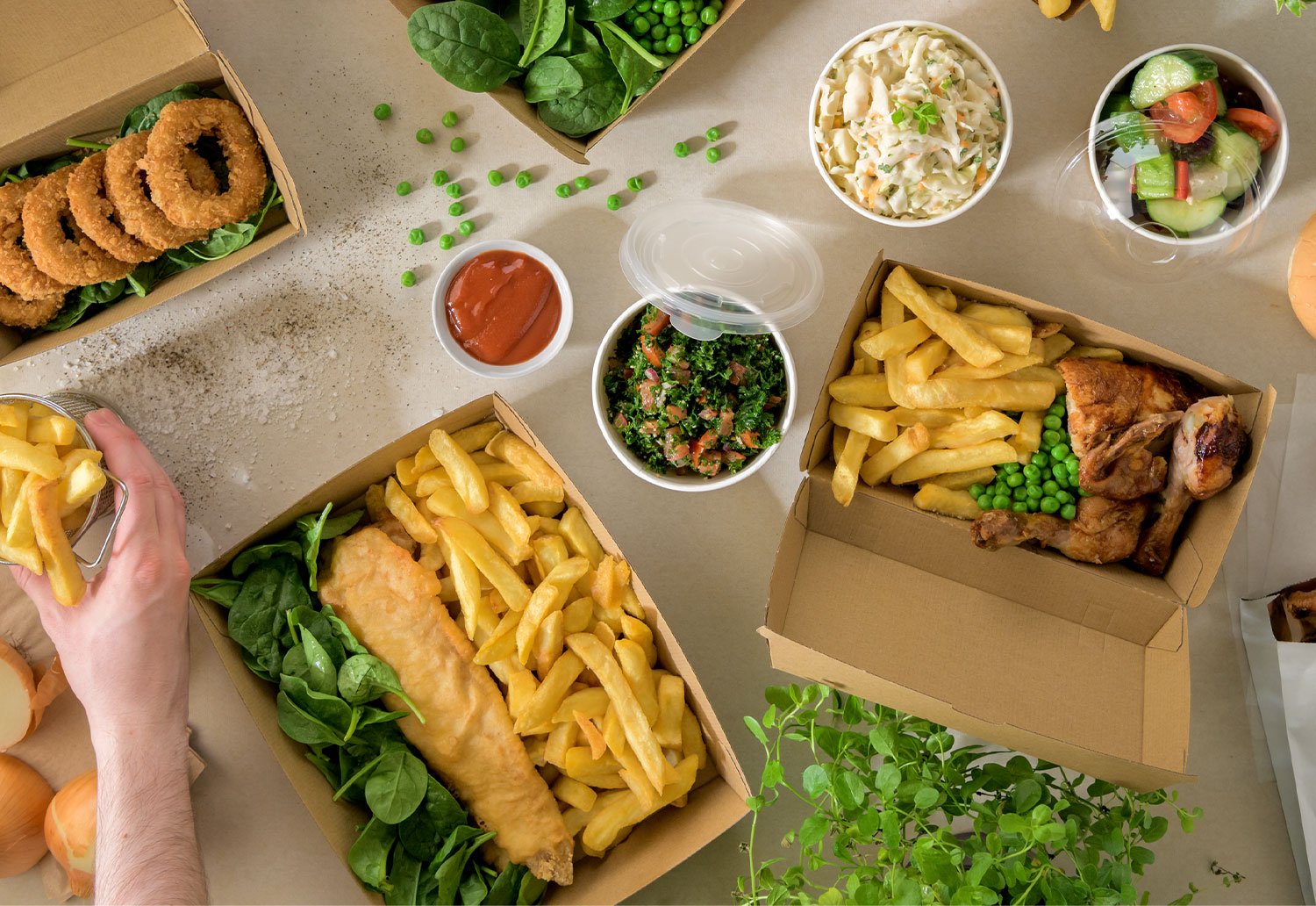 Images of takeaway packaging, with food efficiently packed inside