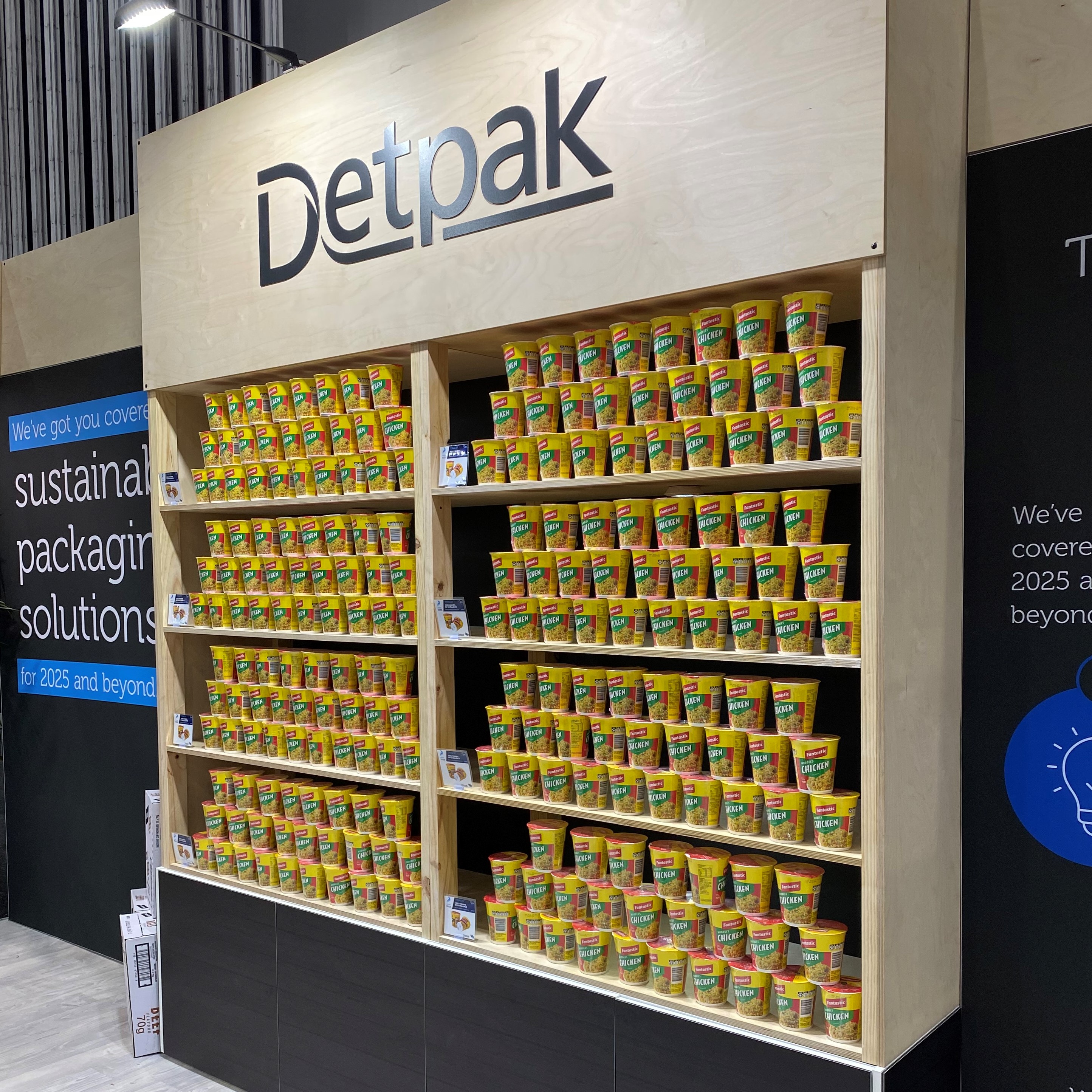 Stand full of Detpak RecycleMe™ Noodle Cups.