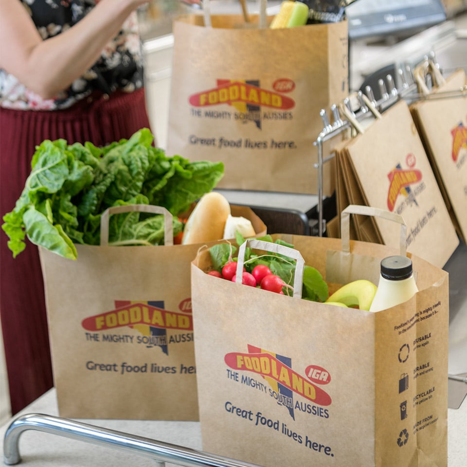 Image of Foodland bag stacked with groceries 