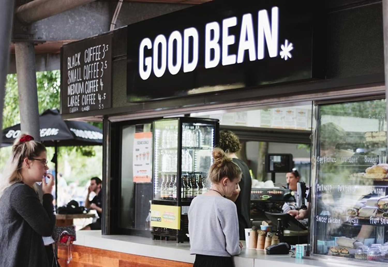 Image of person being served at a Good Bean counter