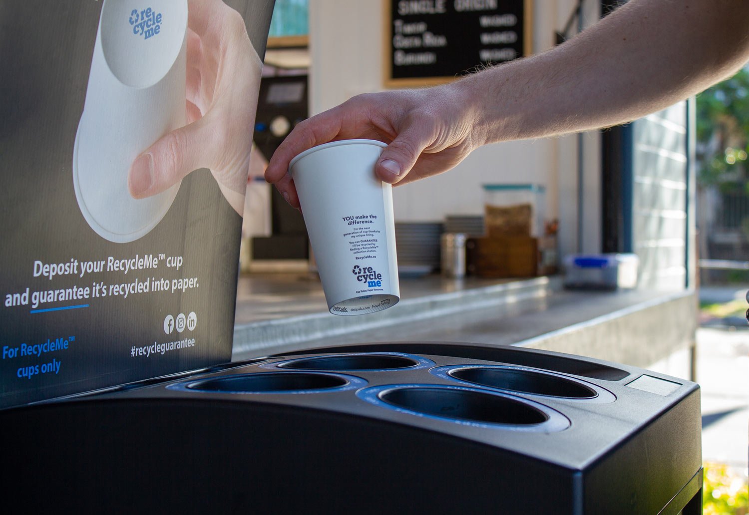 Image of a RecycleMe Collection station, paired with a Seven Miles Coffee