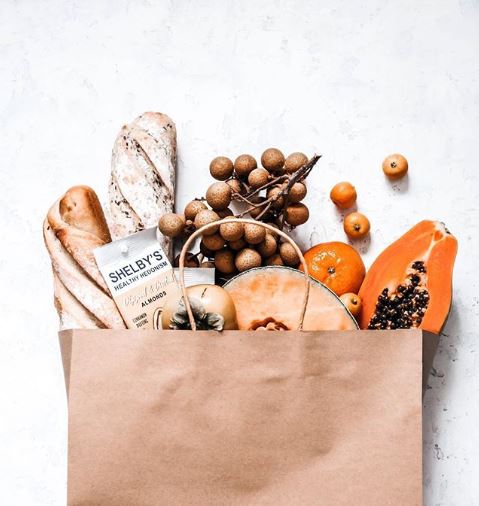 Image of paper bag with pumpkin inside