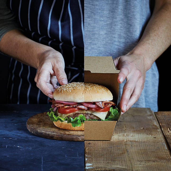 burger on wooden bench