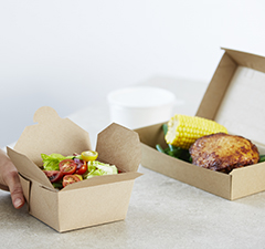Restaurant food packaged in cartons for delivery