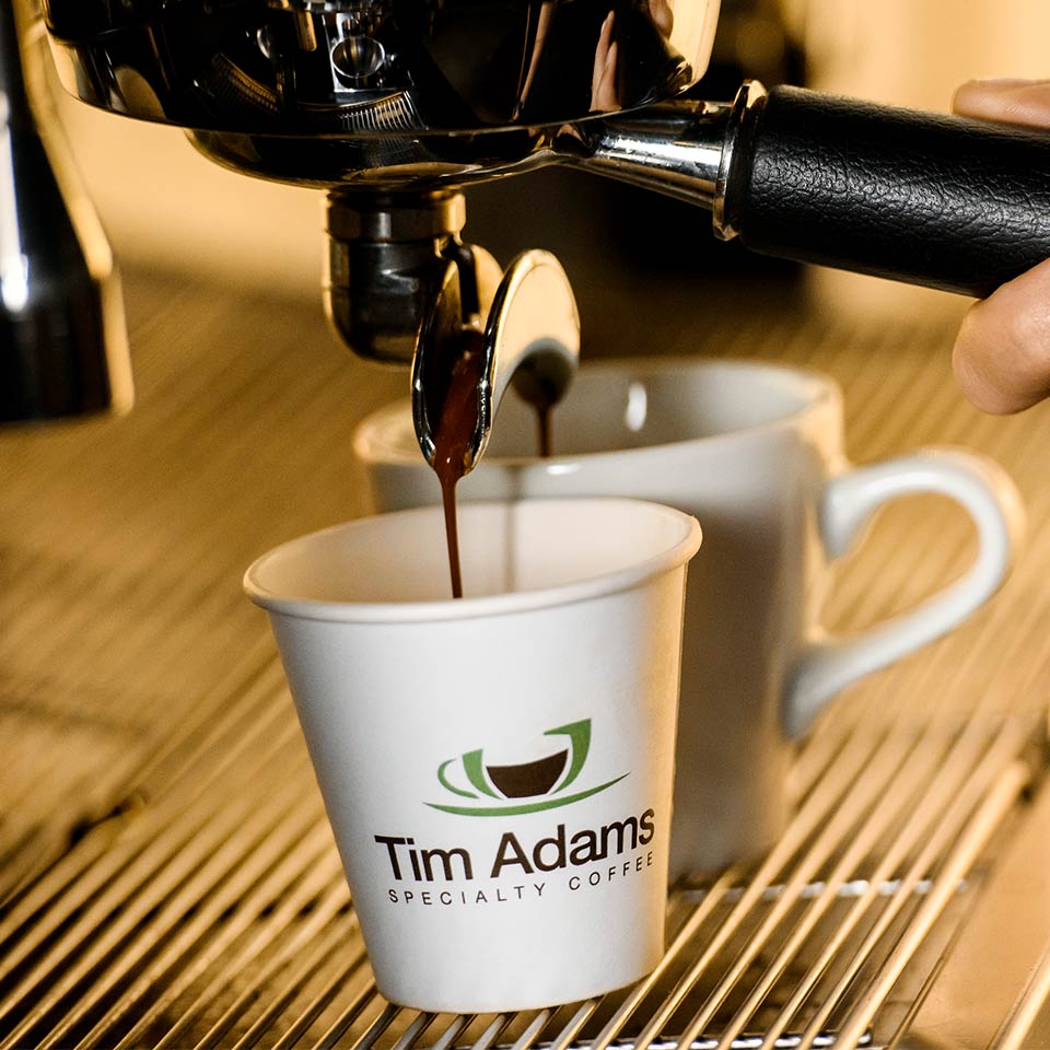 Precision Takeaway Cup sitting under coffee shot section of a coffee machine